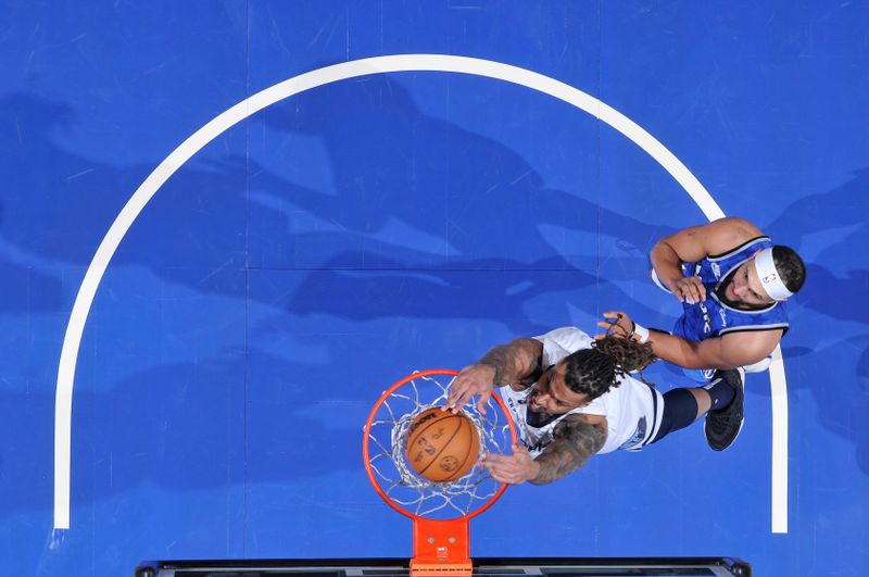 ORLANDO, FL - MARCH 30: Brandon Clarke #15 of the Memphis Grizzlies dunks the ball during the game against the Orlando Magic on March 30, 2024 at the Kia Center in Orlando, Florida. NOTE TO USER: User expressly acknowledges and agrees that, by downloading and or using this photograph, User is consenting to the terms and conditions of the Getty Images License Agreement. Mandatory Copyright Notice: Copyright 2024 NBAE (Photo by Fernando Medina/NBAE via Getty Images)