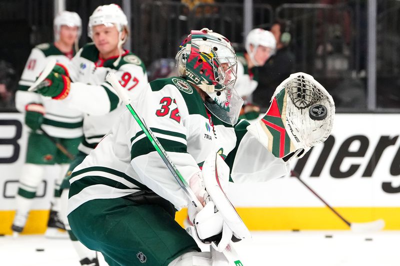 Apr 20, 2025; Las Vegas, Nevada, USA; Minnesota Wild goaltender Filip Gustavsson (32) warms up before game one of the first round of the 2025 Stanley Cup Playoffs against the Vegas Golden Knights at T-Mobile Arena. Mandatory Credit: Stephen R. Sylvanie-Imagn Images