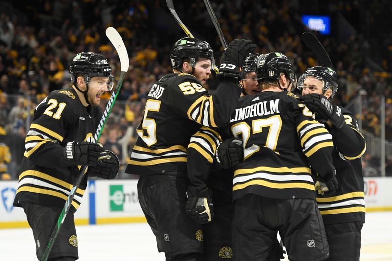 May 4, 2024; Boston, Massachusetts, USA; The Boston Bruins celebrate after tying the game during the third period in game seven of the first round of the 2024 Stanley Cup Playoffs against the Toronto Maple Leafs at TD Garden. Mandatory Credit: Bob DeChiara-USA TODAY Sports