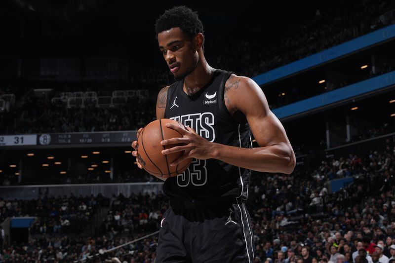 BROOKLYN, NY - JANUARY 25: Nicolas Claxton #33 of the Brooklyn Nets looks on during the game against the Minnesota Timberwolves on January 25, 2024 at Barclays Center in Brooklyn, New York. NOTE TO USER: User expressly acknowledges and agrees that, by downloading and or using this Photograph, user is consenting to the terms and conditions of the Getty Images License Agreement. Mandatory Copyright Notice: Copyright 2024 NBAE (Photo by Jesse D. Garrabrant/NBAE via Getty Images)