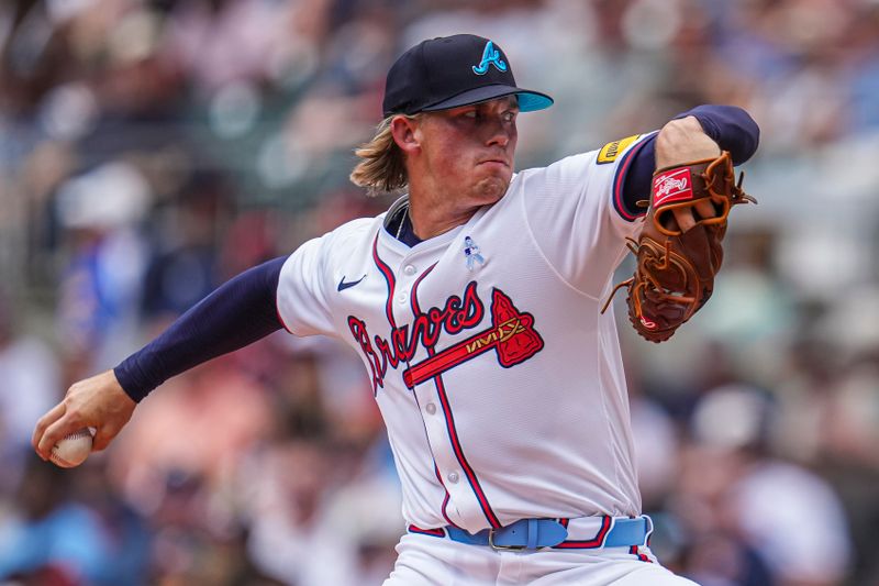 Jun 16, 2024; Cumberland, Georgia, USA; Atlanta Braves starting pitcher Hurston Waldrep (30) pitches against the Tampa Bay Rays at Truist Park. Mandatory Credit: Dale Zanine-USA TODAY Sports