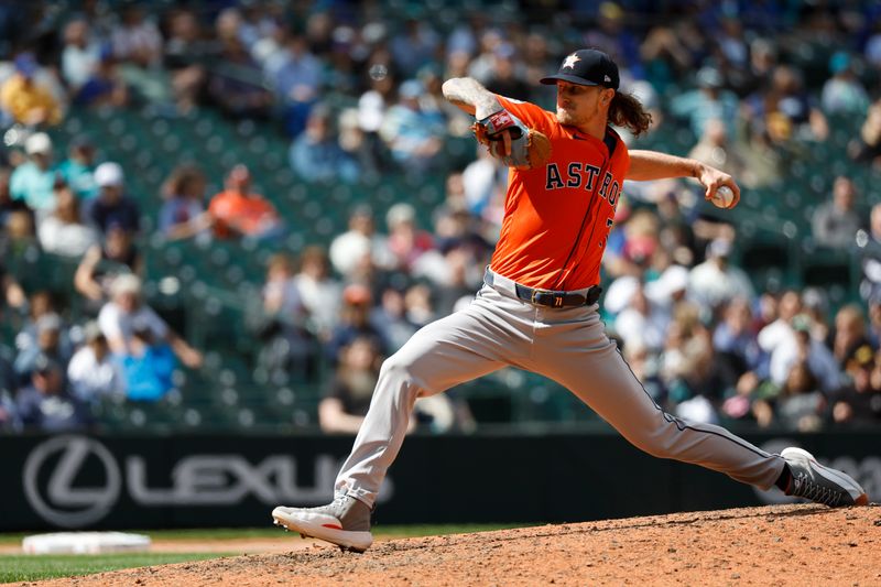 May 30, 2024; Seattle, Washington, USA; Houston Astros relief pitcher Josh Hader (71) throws against the Seattle Mariners during the ninth inning at T-Mobile Park. Mandatory Credit: Joe Nicholson-USA TODAY Sports