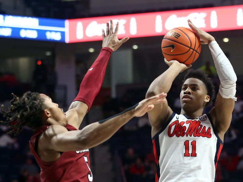 Feb 11, 2023; Oxford, Mississippi, USA; Mississippi Rebels guard Matthew Murrell (11) shoots for three during the second half against the South Carolina Gamecocks at The Sandy and John Black Pavilion at Ole Miss. Mandatory Credit: Petre Thomas-USA TODAY Sports