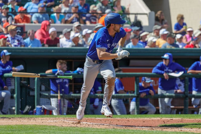 Feb 27, 2024; Lakeland, Florida, USA; Toronto Blue Jays second baseman Ernie Clement (28) runs to first during the third inning against the Detroit Tigers at Publix Field at Joker Marchant Stadium. Mandatory Credit: Mike Watters-USA TODAY Sports