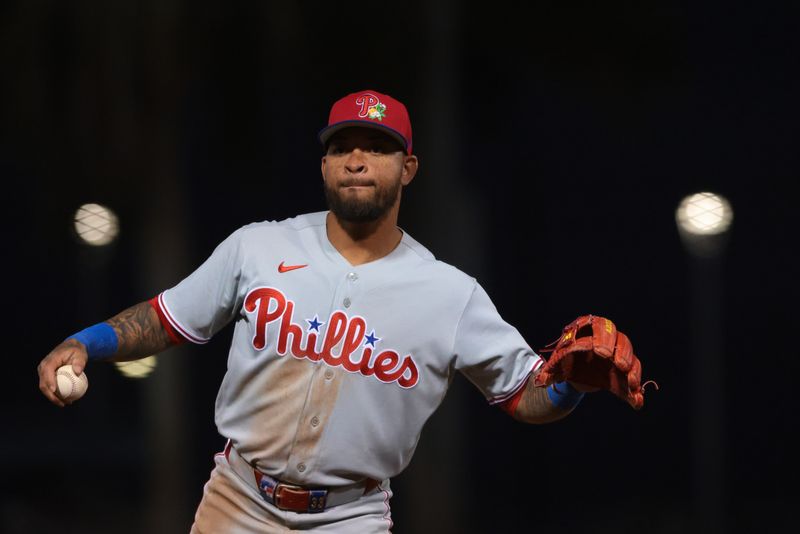 Feb 22, 2026; West Palm Beach, Florida, USA; Philadelphia Phillies third baseman Edmundo Sosa (33) looks on against the Washington Nationals during the second inning at CACTI Park of the Palm Beaches. Mandatory Credit: Sam Navarro-Imagn Images