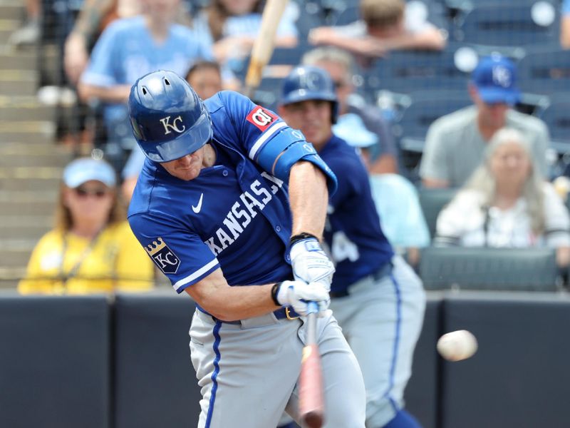 May 1, 2025; St. Petersburg, Florida, USA;  Kansas City Royals right fielder Mark Canha (21) singles during the seventh inning against the Tampa Bay Rays at George M. Steinbrenner Field. Mandatory Credit: Kim Klement Neitzel-Imagn Images