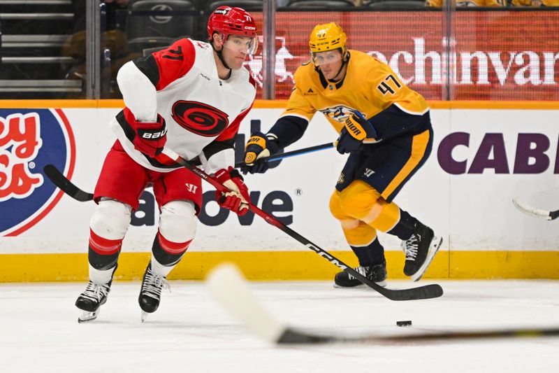 Dec 17, 2025; Nashville, Tennessee, USA;  Carolina Hurricanes left wing Taylor Hall (71) skates with the puck against the Nashville Predators during the second period at Bridgestone Arena. Mandatory Credit: Steve Roberts-Imagn Images
