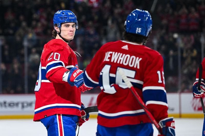 Mar 12, 2024; Montreal, Quebec, CAN; Montreal Canadiens left wing Juraj Slafkovsky (20) celebrates his goal against the Columbus Blue Jackets with his teammates during the first period at Bell Centre. Mandatory Credit: David Kirouac-USA TODAY Sports