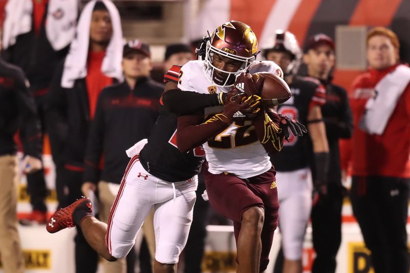 Oct 16, 2021; Salt Lake City, Utah, USA; Utah Utes cornerback Faybian Marks (23) defends Arizona State Sun Devils wide receiver Bryan Thompson (22) during the second quarter at Rice-Eccles Stadium. Mandatory Credit: Rob Gray-USA TODAY Sports