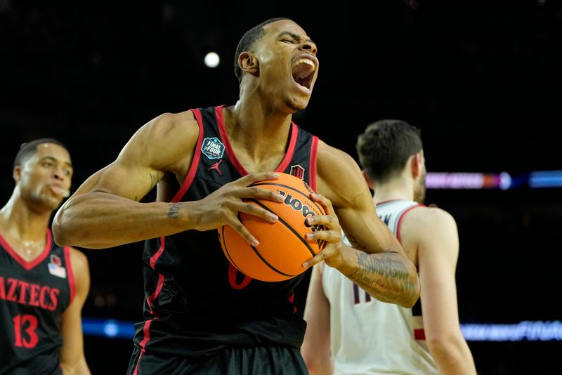 Apr 3, 2023; Houston, TX, USA; San Diego State Aztecs forward Keshad Johnson (0) reacts after a play against the Connecticut Huskies during the second half in the national championship game of the 2023 NCAA Tournament at NRG Stadium. Mandatory Credit: Bob Donnan-USA TODAY Sports