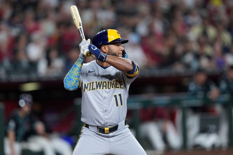 Apr 12, 2025; Phoenix, Arizona, USA; Milwaukee Brewers outfielder Jackson Chourio (11) bats against the Arizona Diamondbacks during the sixth inning at Chase Field. Mandatory Credit: Joe Camporeale-Imagn Images
