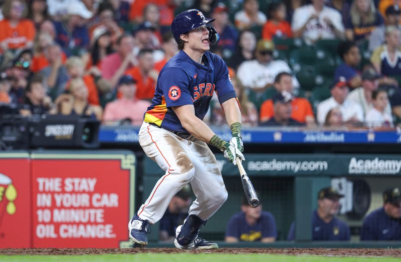 May 19, 2024; Houston, Texas, USA; Houston Astros center fielder Jake Meyers (6) hits a single during the fifth inning against the Milwaukee Brewers at Minute Maid Park. Mandatory Credit: Troy Taormina-USA TODAY Sports