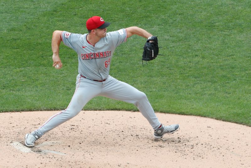 Aug 25, 2024; Pittsburgh, Pennsylvania, USA;  Cincinnati Reds relief pitcher Carson Spiers (68) pitches against the Pittsburgh Pirates during the fourth inning at PNC Park. Mandatory Credit: Charles LeClaire-USA TODAY Sports