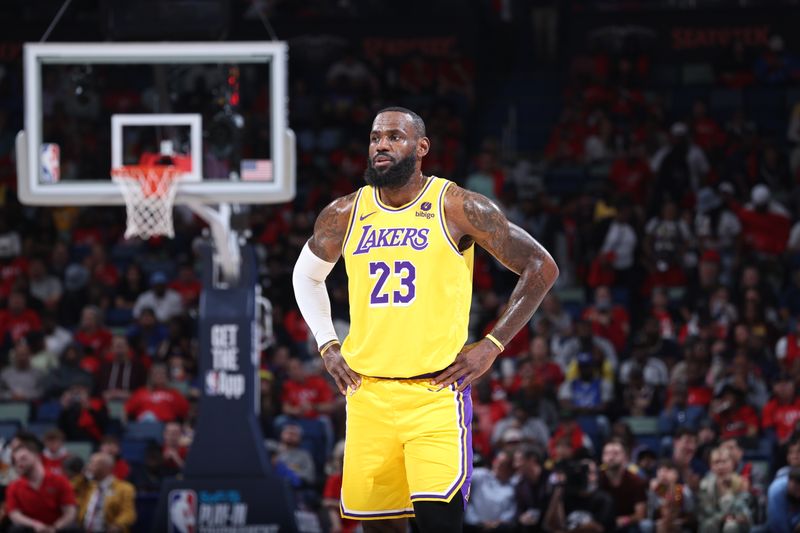 NEW ORLEANS, LA - APRIL 16: LeBron James #23 of the Los Angeles Lakers looks on during the game against the New Orleans Pelicans during the 2024 Play-In Tournament on April 16, 2024 at the Smoothie King Center in New Orleans, Louisiana. NOTE TO USER: User expressly acknowledges and agrees that, by downloading and or using this Photograph, user is consenting to the terms and conditions of the Getty Images License Agreement. Mandatory Copyright Notice: Copyright 2024 NBAE (Photo by Jeff Haynes/NBAE via Getty Images)