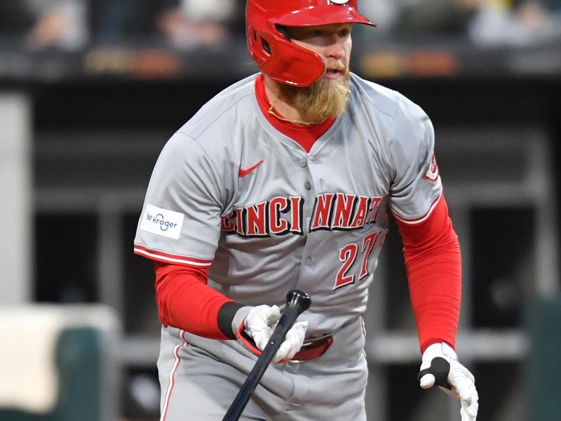 Apr 12, 2024; Chicago, Illinois, USA; Cincinnati Reds left fielder Spencer Steer (7) hits an RBI single during the third inning against the Chicago White Sox at Guaranteed Rate Field. Mandatory Credit: Patrick Gorski-USA TODAY Sports