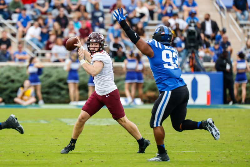 Nov 12, 2022; Durham, North Carolina, USA;  Virginia Tech Hokies quarterback Grant Wells (6) prepares to throw the ball during the second half against Duke Blue Devils at Wallace Wade Stadium. Mandatory Credit: Jaylynn Nash-USA TODAY Sports