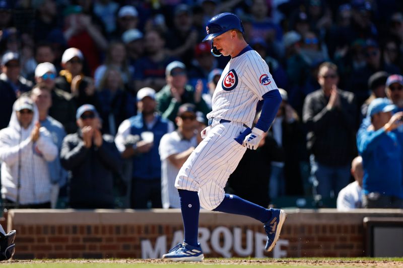 Apr 25, 2024; Chicago, Illinois, USA; Chicago Cubs centerfielder Pete Crow-Armstrong (52) crosses home plate after hitting a two-run home run against the Houston Astros during the sixth inning at Wrigley Field. Mandatory Credit: Kamil Krzaczynski-USA TODAY Sports