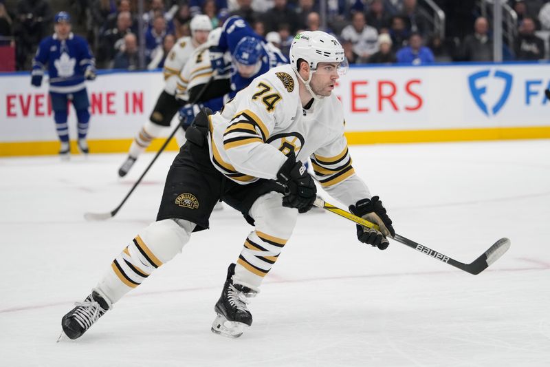 Apr 24, 2024; Toronto, Ontario, CAN; Boston Bruins forward Jake DeBrusk (74) skates against the Toronto Maple Leafs during the third period of game three of the first round of the 2024 Stanley Cup Playoffs at Scotiabank Arena. Mandatory Credit: John E. Sokolowski-USA TODAY Sports