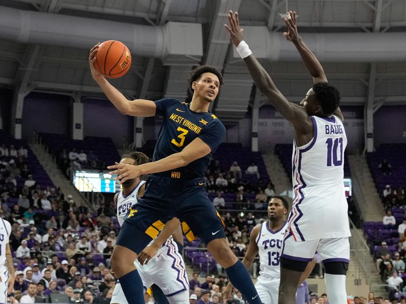 Jan 31, 2023; Fort Worth, Texas, USA; West Virginia Mountaineers forward Tre Mitchell (3) passes the ball against TCU Horned Frogs guard Damion Baugh (10) during the second half at Ed and Rae Schollmaier Arena. Mandatory Credit: Chris Jones-USA TODAY Sports