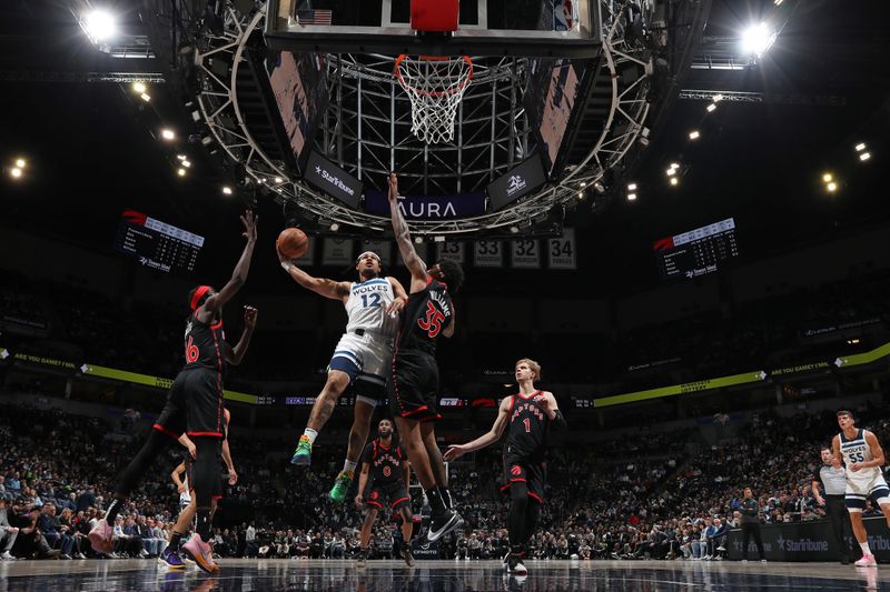 MINNEAPOLIS, MN -  APRIL 3: Daishen Nix #12 of the Minnesota Timberwolves shoots the ball during the game against the Toronto Raptors  on April 3, 2024 at Target Center in Minneapolis, Minnesota. NOTE TO USER: User expressly acknowledges and agrees that, by downloading and or using this Photograph, user is consenting to the terms and conditions of the Getty Images License Agreement. Mandatory Copyright Notice: Copyright 2024 NBAE (Photo by Jordan Johnson/NBAE via Getty Images)