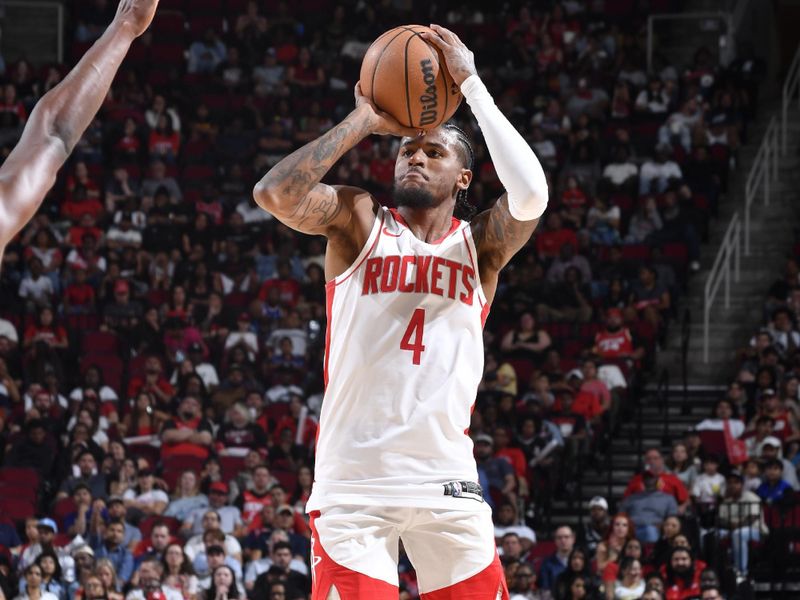 HOUSTON, TX - OCTOBER 15: Jalen Green #4 of the Houston Rockets shoots a three point basket during the game against the New Orleans Pelicans during a NBA preseason game on October 15, 2024 at the Toyota Center in Houston, Texas. NOTE TO USER: User expressly acknowledges and agrees that, by downloading and or using this photograph, User is consenting to the terms and conditions of the Getty Images License Agreement. Mandatory Copyright Notice: Copyright 2024 NBAE (Photo by Logan Riely/NBAE via Getty Images)