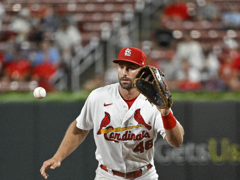 Aug 14, 2023; St. Louis, Missouri, USA;  St. Louis Cardinals first baseman Paul Goldschmidt (46) fields a ground ball against the Oakland Athletics during the eighth inning at Busch Stadium. Mandatory Credit: Jeff Curry-USA TODAY Sports