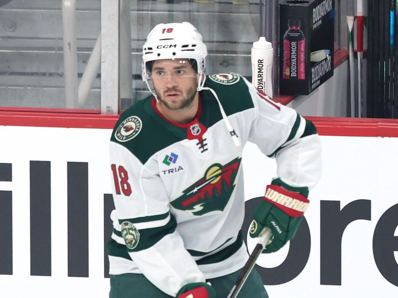Sep 21, 2025; Winnipeg, Manitoba, CAN; Minnesota Wild center Vinnie Hinostroza (18) warms up before a game against the Winnipeg Jets at Canada Life Centre. Mandatory Credit: James Carey Lauder-Imagn Images