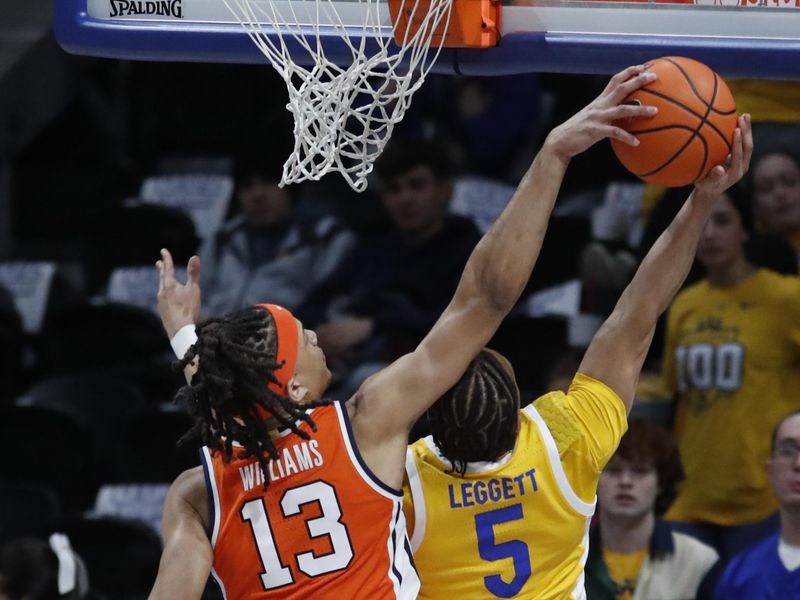 Jan 16, 2024; Pittsburgh, Pennsylvania, USA; Syracuse Orange forward Benny Williams (13) blocks a shot attempt of Pittsburgh Panthers guard Ishmael Leggett (5) during the second half at the Petersen Events Center. Syracuse won 69-58. Mandatory Credit: Charles LeClaire-USA TODAY Sports