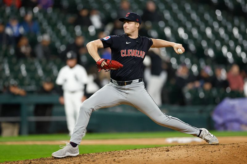 May 9, 2024; Chicago, Illinois, USA; Cleveland Guardians relief pitcher Tim Herrin (29) delivers a pitch against the Chicago White Sox during the eight inning at Guaranteed Rate Field. Mandatory Credit: Kamil Krzaczynski-USA TODAY Sports