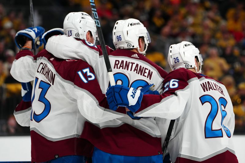 Apr 14, 2024; Las Vegas, Nevada, USA; Colorado Avalanche right wing Mikko Rantanen (96) celebrates with Colorado Avalanche right wing Valeri Nichushkin (13) and defenseman Sean Walker (26) after scoring a goal against the Vegas Golden Knights during the second period at T-Mobile Arena. Mandatory Credit: Stephen R. Sylvanie-USA TODAY Sports