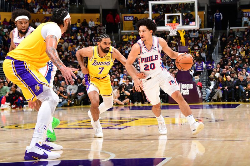 LOS ANGELES, CA - NOVEMBER 8: Jared McCain #20 of the Philadelphia 76ers dribbles the ball during the game against the Los Angeles Lakers on November 8, 2024 at Crypto.Com Arena in Los Angeles, California. NOTE TO USER: User expressly acknowledges and agrees that, by downloading and/or using this Photograph, user is consenting to the terms and conditions of the Getty Images License Agreement. Mandatory Copyright Notice: Copyright 2024 NBAE (Photo by Adam Pantozzi/NBAE via Getty Images)