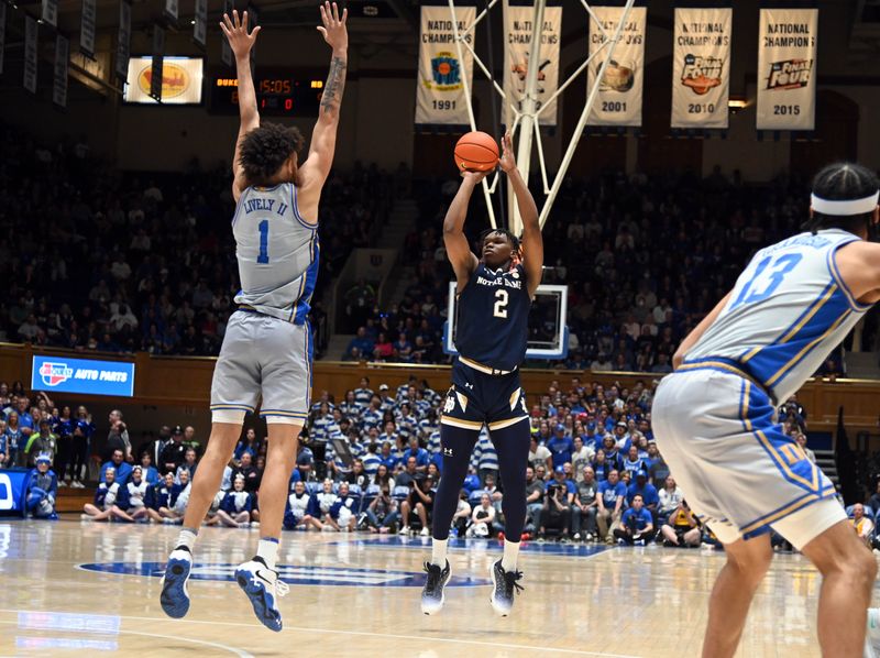 Feb 14, 2023; Durham, North Carolina, USA;  Notre Dame Fighting Irish forward Ven-Allen Lubin (2) shoots over Duke Blue Devils center Dereck Lively (1) during the first half at Cameron Indoor Stadium. Mandatory Credit: Rob Kinnan-USA TODAY Sports