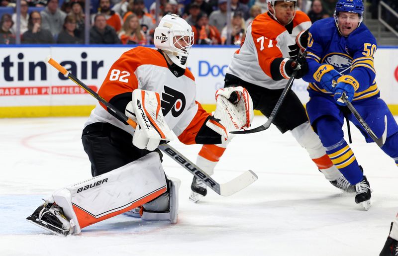 Apr 5, 2024; Buffalo, New York, USA;  Philadelphia Flyers goaltender Ivan Fedotov (82) makes a glove save during the second period against the Buffalo Sabres at KeyBank Center. Mandatory Credit: Timothy T. Ludwig-USA TODAY Sports