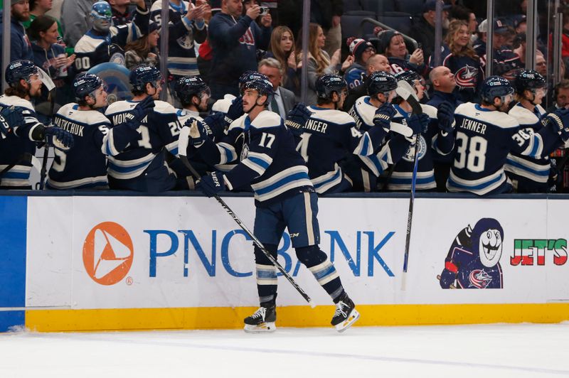 Mar 17, 2026; Columbus, Ohio, USA; Columbus Blue Jackets left wing Mason Marchment (17) celebrates his goal against the Carolina Hurricanes during the first period at Nationwide Arena. Mandatory Credit: Russell LaBounty-Imagn Images