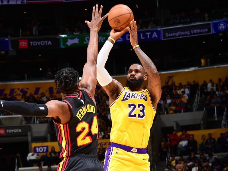 LOS ANGELES, CA - MARCH 18:  LeBron James #23 of the Los Angeles Lakers shoots the ball during the game  on March 18, 2024 at Crypto.Com Arena in Los Angeles, California. NOTE TO USER: User expressly acknowledges and agrees that, by downloading and/or using this Photograph, user is consenting to the terms and conditions of the Getty Images License Agreement. Mandatory Copyright Notice: Copyright 2024 NBAE (Photo by Adam Pantozzi/NBAE via Getty Images)