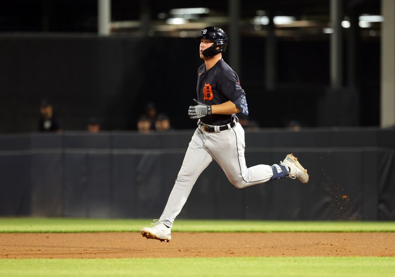 Feb 27, 2023; Tampa, Florida, USA; Detroit Tigers first baseman Spencer Torkelson (20) singles during the third inning against the New York Yankees at George M. Steinbrenner Field. Mandatory Credit: Kim Klement-USA TODAY Sports