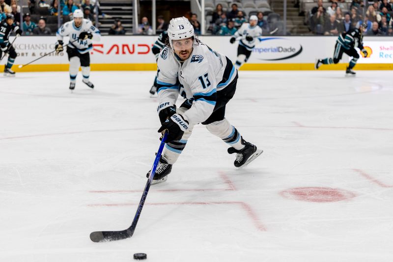 Nov 18, 2025; San Jose, California, USA; Utah Mammoth left wing Brandon Tanev (13) controls the puck during the second period against the San Jose Sharks at SAP Center at San Jose. Mandatory Credit: Bob Kupbens-Imagn Images