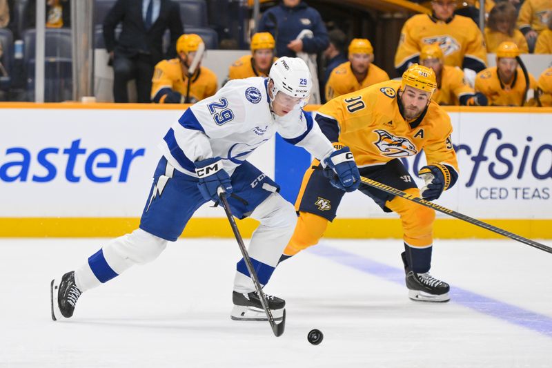 Oct 28, 2025; Nashville, Tennessee, USA;  Tampa Bay Lightning right wing Pontus Holmberg (29) skates with the puck against the Nashville Predators during the second period at Bridgestone Arena. Mandatory Credit: Steve Roberts-Imagn Images