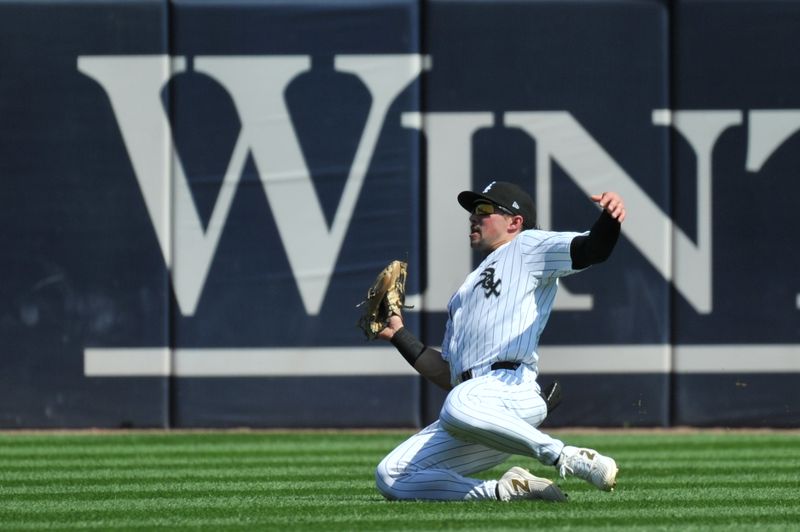 Aug 25, 2024; Chicago, Illinois, USA; Chicago White Sox center fielder Dominic Fletcher (7) catches a flyball during the fourth inning against the Detroit Tigers at Guaranteed Rate Field. Mandatory Credit: Patrick Gorski-USA TODAY Sports
