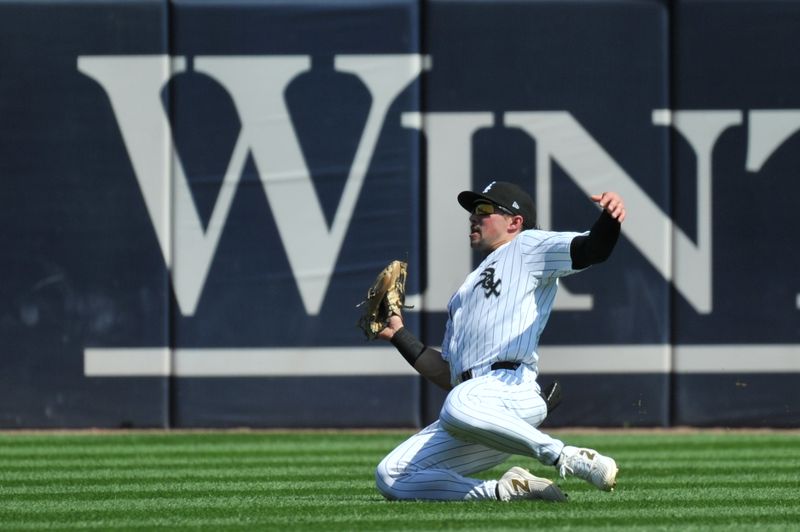 Aug 25, 2024; Chicago, Illinois, USA; Chicago White Sox center fielder Dominic Fletcher (7) catches a flyball during the fourth inning against the Detroit Tigers at Guaranteed Rate Field. Mandatory Credit: Patrick Gorski-USA TODAY Sports