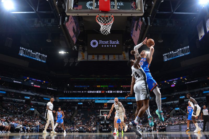 SAN ANTONIO, TX - OCTOBER 7: Isaiah Hartenstein #55 of the Oklahoma City Thunder drives to the basket during the game against the San Antonio Spurs during a NBA preseason game on October 7, 2024 at the Frost Bank Center in San Antonio, Texas. NOTE TO USER: User expressly acknowledges and agrees that, by downloading and or using this photograph, user is consenting to the terms and conditions of the Getty Images License Agreement. Mandatory Copyright Notice: Copyright 2024 NBAE (Photos by Michael Gonzales/NBAE via Getty Images)