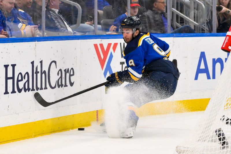 Mar 23, 2025; St. Louis, Missouri, USA;  St. Louis Blues center Alexandre Texier (9) controls the puck against the Nashville Predators during the second period at Enterprise Center. Mandatory Credit: Jeff Curry-Imagn Images