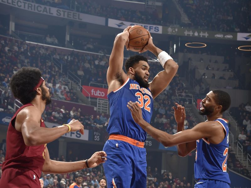 CLEVELAND, OH - APRIL 2: Karl-Anthony Towns #32 of the New York Knicks rebounds the ball during the game against the Cleveland Cavaliers on April 2, 2025 at Rocket Arena in Cleveland, Ohio. NOTE TO USER: User expressly acknowledges and agrees that, by downloading and/or using this Photograph, user is consenting to the terms and conditions of the Getty Images License Agreement. Mandatory Copyright Notice: Copyright 2025 NBAE (Photo by David Liam Kyle/NBAE via Getty Images)