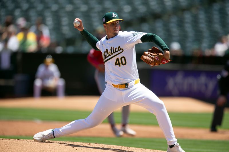 Jul 20, 2024; Oakland, California, USA; Oakland Athletics starting pitcher Mitch Spence (40) delivers a pitch against the Los Angeles Angels during the second inning at Oakland-Alameda County Coliseum. Mandatory Credit: D. Ross Cameron-USA TODAY Sports