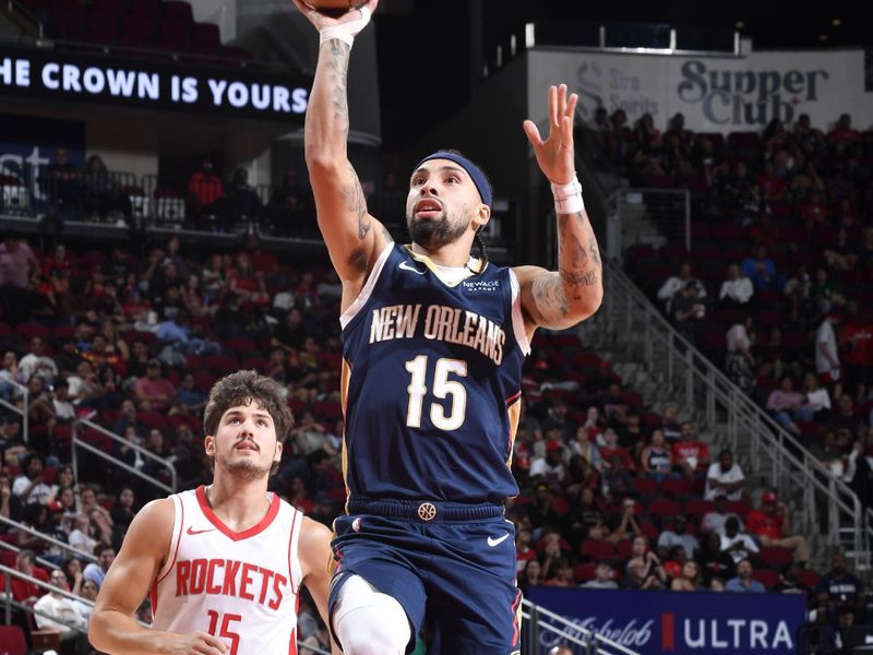 HOUSTON, TX - OCTOBER 15: Jose Alvarado #15 of the New Orleans Pelicans drives to the basket during the game against the Houston Rockets during a NBA preseason game on October 15, 2024 at the Toyota Center in Houston, Texas. NOTE TO USER: User expressly acknowledges and agrees that, by downloading and or using this photograph, User is consenting to the terms and conditions of the Getty Images License Agreement. Mandatory Copyright Notice: Copyright 2024 NBAE (Photo by Logan Riely/NBAE via Getty Images)