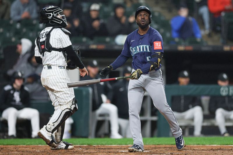 May 20, 2025; Chicago, Illinois, USA; Seattle Mariners left fielder Randy Arozarena (56) reacts after striking out against the Chicago White Sox during the ninth inning at Rate Field. Mandatory Credit: Kamil Krzaczynski-Imagn Images
