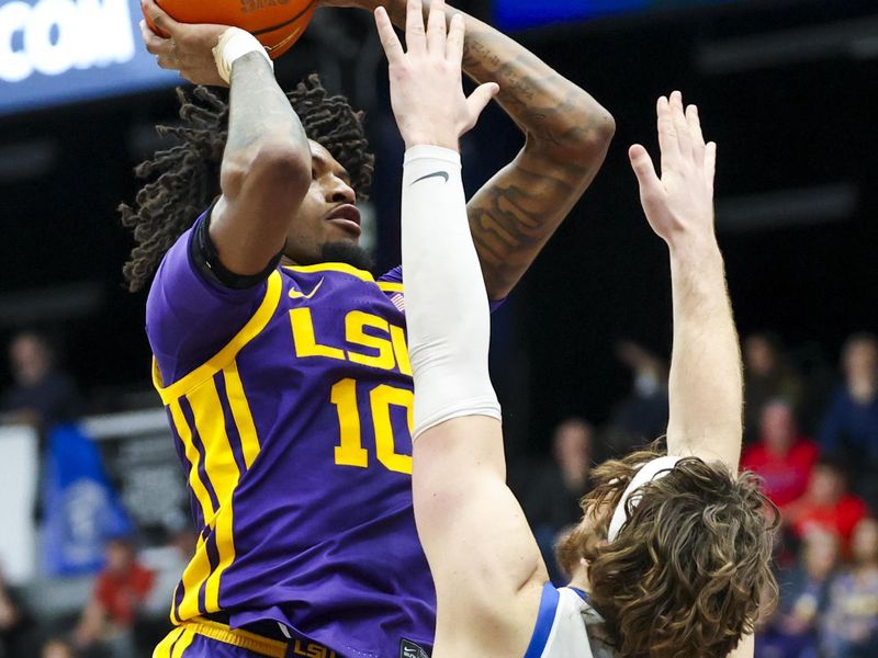 Dec 14, 2024; Frisco, Texas, USA;  LSU Tigers forward Daimion Collins (10) shoots over Southern Methodist Mustangs forward Matt Cross (33) during the second half at Comerica Center. Mandatory Credit: Kevin Jairaj-Imagn Images