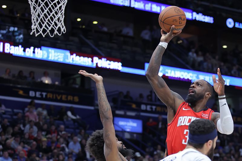 NEW ORLEANS, LOUISIANA - FEBRUARY 22: Jeff Green #32 of the Houston Rockets shoots over Naji Marshall #8 of the New Orleans Pelicans during the first half at the Smoothie King Center on February 22, 2024 in New Orleans, Louisiana. NOTE TO USER: User expressly acknowledges and agrees that, by downloading and or using this Photograph, user is consenting to the terms and conditions of the Getty Images License Agreement. (Photo by Jonathan Bachman/Getty Images)