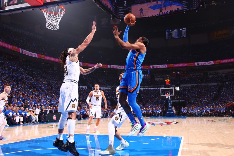OKLAHOMA CITY, OK - MAY 18: Jalen Williams #8 of the Oklahoma City Thunder shoots the ball during the game against the Denver Nuggets during Round 2 Game 7 of the 2025 NBA Playoffs on May 18, 2025 at Paycom Center in Oklahoma City, Oklahoma. NOTE TO USER: User expressly acknowledges and agrees that, by downloading and or using this photograph, User is consenting to the terms and conditions of the Getty Images License Agreement. Mandatory Copyright Notice: Copyright 2025 NBAE (Photo by Zach Beeker/NBAE via Getty Images)