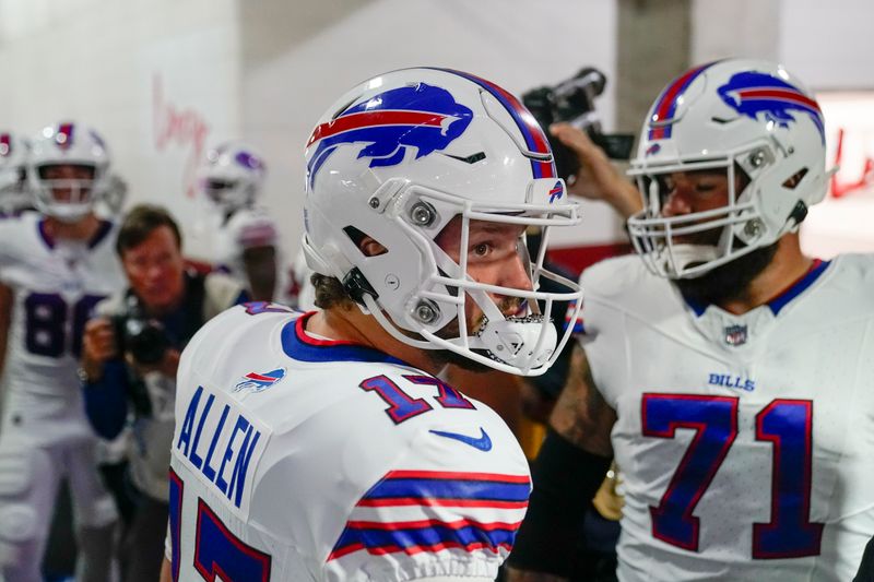 Buffalo Bills quarterback Josh Allen (17) and guard Ryan Bates (71) in the tunnel before the start of an NFL football game against the Washington Commanders, Sunday, Sept. 24, 2023, in Landover, Md. (AP Photo/Andrew Harnik)